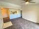 Bright living room with ceiling fan and open floor plan to the kitchen at 555 E Silverado Ranch Blvd # 2030, Las Vegas, NV 89183
