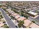 Panoramic aerial view highlighting a neighborhood with green spaces, community features, and well-designed residential properties at 5620 Siena Rose St, North Las Vegas, NV 89031