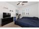Comfortable bedroom with large windows offering plenty of natural light at 5620 Siena Rose St, North Las Vegas, NV 89031