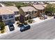 Exterior aerial view of a home featuring a well-maintained lawn, and a two-car garage at 5620 Siena Rose St, North Las Vegas, NV 89031