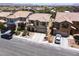 Exterior aerial view of a home featuring a well-maintained lawn, and a two-car garage at 5620 Siena Rose St, North Las Vegas, NV 89031