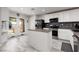 Bright open kitchen with stainless steel appliances and access to backyard at 5620 Siena Rose St, North Las Vegas, NV 89031