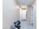 Inviting entryway with tiled floor, featuring coat closet, and access to other areas of the home at 668 Tiarella Ln, Henderson, NV 89015