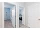 Hallway showcasing access to bedrooms, highlighting the home's layout and design at 668 Tiarella Ln, Henderson, NV 89015