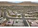 This aerial shot showcases the neighborhood, mountain views, and streetscapes in this community at 6804 Regency Stone Way, Las Vegas, NV 89148