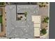 An overhead aerial view reveals the geometric roof design and central courtyard at 6804 Regency Stone Way, Las Vegas, NV 89148