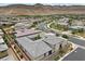 An aerial view of the home showcasing the landscaping, tile roof and mountain views at 6804 Regency Stone Way, Las Vegas, NV 89148