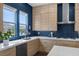 Well-lit kitchen with stainless steel appliances, ample counter space, modern fixtures, and a stylish backsplash at 6804 Regency Stone Way, Las Vegas, NV 89148