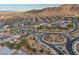 Aerial view of the residential neighborhood, showcasing the roundabout at 6804 Regency Stone Way, Las Vegas, NV 89148