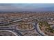 Panoramic aerial view of the residential neighborhood with city skyline at 6804 Regency Stone Way, Las Vegas, NV 89148