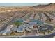 Aerial view of community recreation center with pool and tennis courts at 6804 Regency Stone Way, Las Vegas, NV 89148