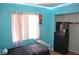 Comfortable bedroom with a window, closet space, and neutral tones at 7340 Alpine Ridge St, Las Vegas, NV 89131