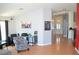 Hallway features hardwood floors, neutral walls, and views into the living room at 7340 Alpine Ridge St, Las Vegas, NV 89131