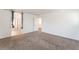 Spacious bedroom with carpet flooring and an ensuite bathroom at 7553 Virginia Dale St, Las Vegas, NV 89131