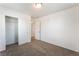 Bright bedroom featuring a closet, doorway, and neutral carpeting, providing a comfortable and versatile living space at 7553 Virginia Dale St, Las Vegas, NV 89131