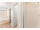 Bright bathroom featuring a walk-in shower, soaking tub, and access to the closet providing a fresh and modern feel at 7553 Virginia Dale St, Las Vegas, NV 89131