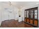 Bright entryway featuring hardwood floors, high ceilings and stylish lighting fixture at 7927 Villa Salsa Ave, Las Vegas, NV 89131