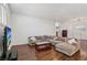 Comfortable living room featuring hardwood floors and natural light at 7927 Villa Salsa Ave, Las Vegas, NV 89131