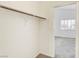 Bedroom with closet and a window offering backyard views at 8301 Boseck Dr # 232, Las Vegas, NV 89145