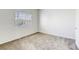 Bright bedroom with carpet flooring and a large window for natural light at 8301 Boseck Dr # 232, Las Vegas, NV 89145