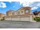 Charming townhome featuring three garages and desert landscaping at 8301 Boseck Dr # 232, Las Vegas, NV 89145