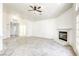 Spacious open-concept living area with a fireplace feature at 8301 Boseck Dr # 232, Las Vegas, NV 89145