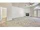 Bright living room featuring a fireplace and neutral carpet at 8301 Boseck Dr # 232, Las Vegas, NV 89145