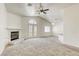 Spacious living room with a fireplace and natural light at 8301 Boseck Dr # 232, Las Vegas, NV 89145