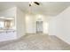 Light-filled living space adjacent to an eat-in kitchen area at 8301 Boseck Dr # 232, Las Vegas, NV 89145