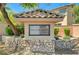 Welcoming community entrance with stone accents and lush landscaping at 9092 National Park Dr, Las Vegas, NV 89178