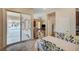 Open-concept kitchen offers an eat-in area, direct patio access, and a convenient flow to the living room at 9092 National Park Dr, Las Vegas, NV 89178