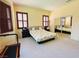 Bright main bedroom with large windows and mirrored closet doors at 9092 National Park Dr, Las Vegas, NV 89178