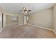 Bedroom features carpeting, ceiling fan, window and a mirrored closet at 9409 Kayla Ct, Las Vegas, NV 89134