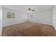 Spacious bedroom featuring three windows, ceiling fan and neutral carpeting at 9409 Kayla Ct, Las Vegas, NV 89134