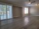 Living room with sliding doors provides a seamless indoor-outdoor transition to the pool area at 9556 Ancala Hollow Ct, Las Vegas, NV 89148