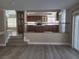 Open-concept living room offers a seamless connection to the kitchen at 9556 Ancala Hollow Ct, Las Vegas, NV 89148