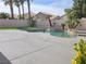Backyard with a large private pool perfect for relaxing or entertaining guests at 9556 Ancala Hollow Ct, Las Vegas, NV 89148