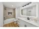 Modern bathroom with double sink vanity, shower with niche, and new fixtures at 9900 Summer Ash Ct # 103, Las Vegas, NV 89134