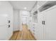 Walk-in closet offers custom built-in shelving and leads to a luxurious bathroom at 9900 Summer Ash Ct # 103, Las Vegas, NV 89134