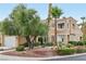 Charming two-story home with a well-maintained yard, mature trees, and a welcoming front entrance at 9900 Summer Ash Ct # 103, Las Vegas, NV 89134