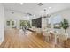 Bright, open-concept living and dining area with stylish furnishings and natural light at 9900 Summer Ash Ct # 103, Las Vegas, NV 89134