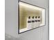 Close-up of a recessed shower niche with gold accent and stylish lotion and soap dispensers at 9900 Summer Ash Ct # 103, Las Vegas, NV 89134