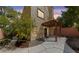 Private backyard with a covered patio, stone accents, and access to indoor/outdoor living at , Las Vegas, NV 89134