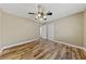 Bright bedroom showcasing sleek wood floors, a ceiling fan, and a closet at , Las Vegas, NV 89134