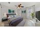 Virtually staged, bright bedroom featuring a plush bed, modern decor, neutral walls, and ample natural light at , Las Vegas, NV 89134