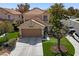 Charming two-story home features a tile roof, landscaped yard, and a two-car garage, enhancing its curb appeal at , Las Vegas, NV 89134