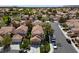 This eye-level exterior view displays a two-story home with a well-maintained lawn and inviting curb appeal at , Las Vegas, NV 89134