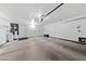 The spacious two-car garage is equipped with shelving, ensuring ample room for parking and storage solutions at , Las Vegas, NV 89134