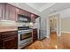 Kitchen featuring stainless steel appliances and dark wood cabinets at , Las Vegas, NV 89134