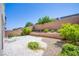 Spacious backyard features decorative rock, concrete patio and privacy walls at 10434 Rose Palisade St, Las Vegas, NV 89141